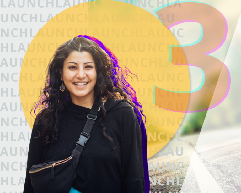 Young woman walking and smiling.